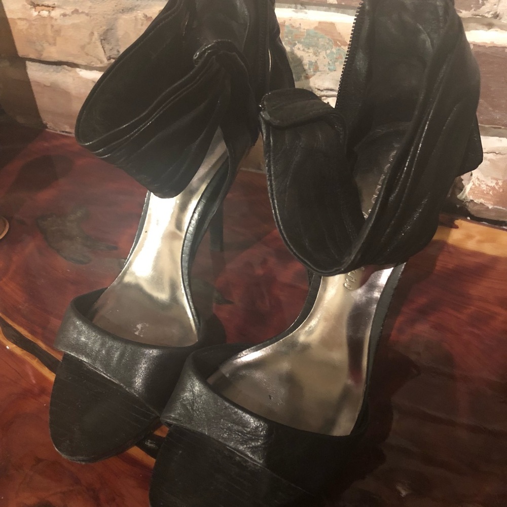 Black leather heels with wide ankle strap